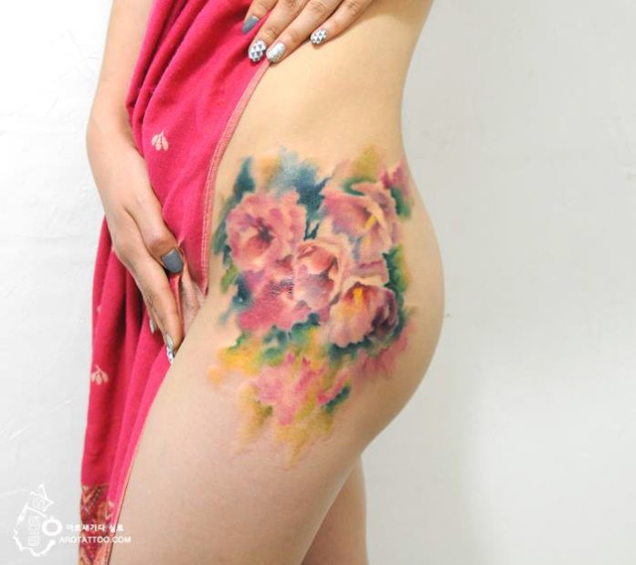 Watercolor Tattoos Mimic Flower Paintings On The Skin